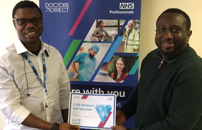 Dennis Osarenren from Coventry and Warwickshire Partnership NHS Trust holding his GEM Awards prize.