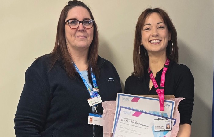 Dr Hannah Ryan from East Suffolk and North Essex NHS  Foundation Trust holding her GEM Awards prize.